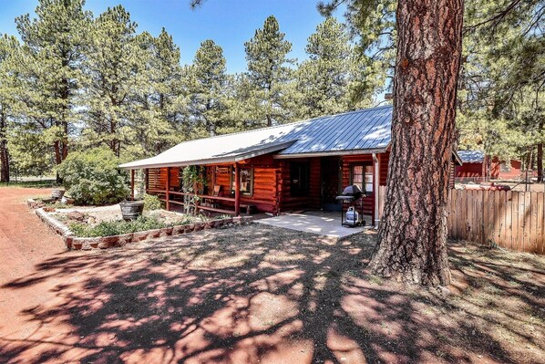 PORTER presents Spring Valley Retreat, an authentic 100-year-old log cabin nestled on the edge of the Kaibab Forest.