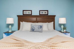 Balanced lighting and decor create a clean, relaxing bedroom vibe
