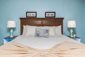 Balanced lighting and decor create a clean, relaxing bedroom vibe