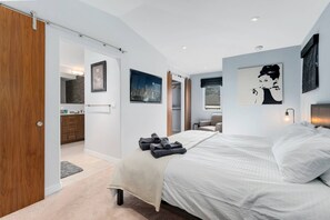 The master bedroom is large and offers an ensuite bath.