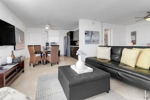 The sleek sofa folds flat into a bed, with linens provided for you to use.