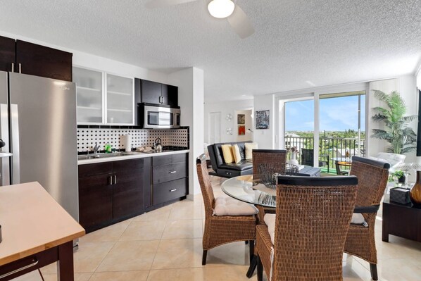 The studio is designed to feel open and spacious, combining living, dining, kitchen and a bedroom space in one open concept.