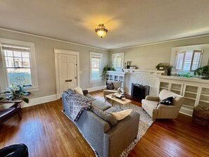 Our living room is off of the front entrance and leads to dining room, office, or stairs.