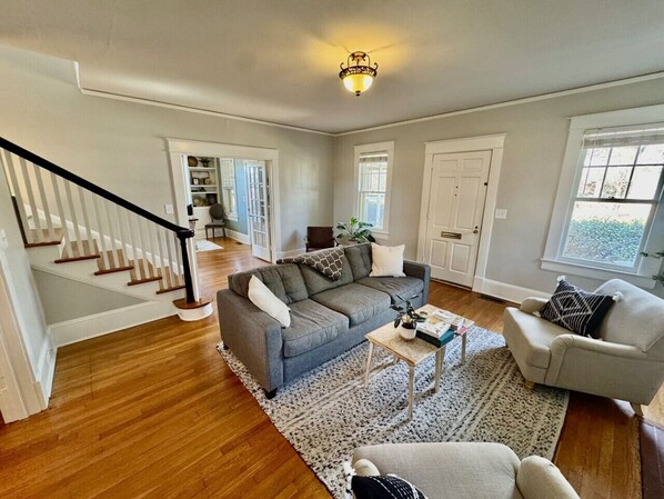 Our living room is off of the front entrance and leads to dining room, office, or stairs.