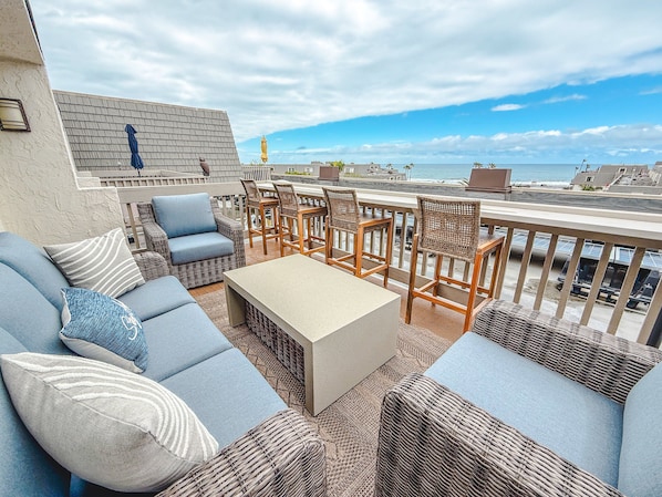 Take in the breathtaking ocean views from the upstairs balcony