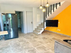 The kitchen and the living room