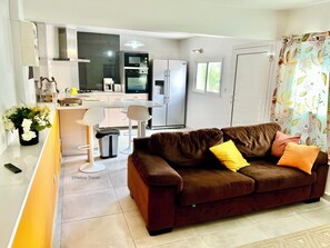 The living room and the kitchen