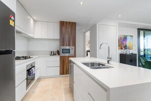 Purely clean, organised, and fully equipped kitchen where you can prepare your mouthwatering food to serve to your friends and family. You can also use the kitchen utensils and appliances available.