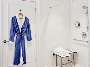 Accessible bathroom thoughtfully designed with a spacious shower and comfortable seating.
