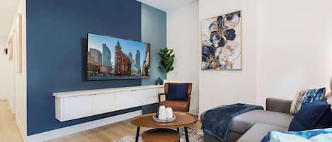 Living room with smart TV and modern furnishings