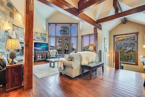 With northwestern views, sunsets are stunning through the expansive windows in the Great Room!