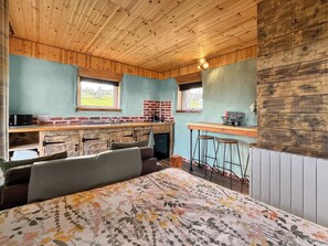 Open plan living space | Honeysuckle Bale Cabin - Straw Bale Cabins, Dallas
