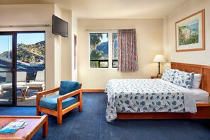 Unit with Queen bed. Exact unit will be assigned upon arrival. Views, colors, and decor may vary.
