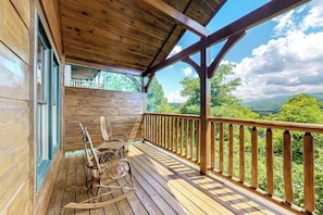 Relax in one of the classic wooden rocking chairs and take in the panoramic mountain views. The perfect spot for sunrise sips or sunset chats.