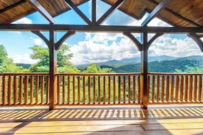 Breathe in the crisp mountain air and unwind on this peaceful perch nestled in the trees. This is what cabin dreams are made of.