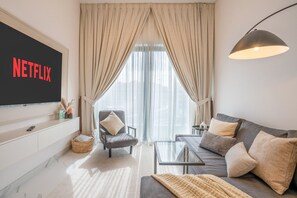 A spacious and inviting living room, perfect for relaxation and entertainment.