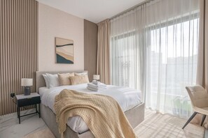 A cozy and well-designed bedroom for a restful stay.