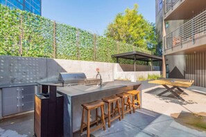 Outdoor grill with seating and ping pong table - utensils and cleaning supplies are included