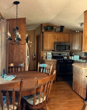 Spacious kitchen/dining room with a gas range