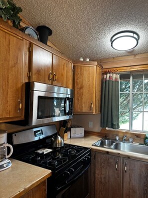 Fully stocked kitchen with all the utensils you will need.