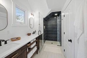 Bathroom upstairs with walk-in shower.