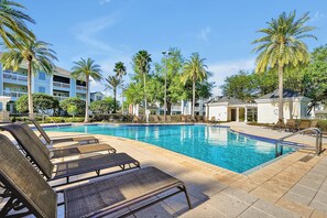 Step into a backyard pool where a sparkling pool awaits. Whether you're taking a refreshing morning swim, lounging under the sun, or enjoying an evening dip, this outdoor space offers relaxation and fun for all.
