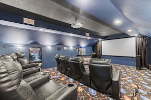 Relax in the Upstairs Movie Theater with Half Bathroom