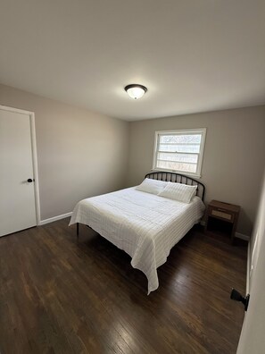 Queen bed and nightstand with built in plug ins and lamp
