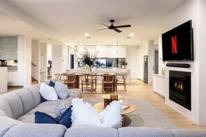 Living Room with Indoor Dining I This beautifully designed living room seamlessly integrates indoor dining, creating a multifunctional space perfect for both relaxation and entertaining. The cozy seating area invites conversation and relax.