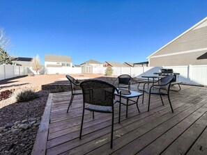 Deck with outdoor seating and grill