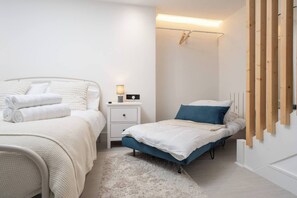 Room Features: 

-1 x Double Bed 
-1 x Sofa Bed 
-Plugs in bedside table (direct USB plug available) 
-Dedicated workspace
 -Smart TV with Netflix 
-Private mini fridge with freezer 
-Open space with hangers 
-Kitchenette
-Washing machine