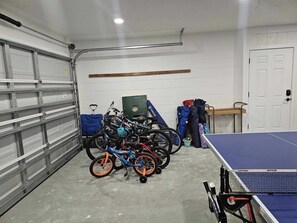 The garage has a grill, bikes, ping pong and more!