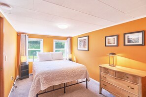 Rest easy in a cozy bedroom with a comfy queen bed.