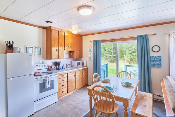 Cozy, well-equipped kitchen with all the essentials for home-cooked meals—perfect for relaxing days.