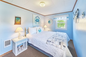A cozy Queen bed and a fold-out Twin chair — perfect for restful nights and extra guests. 🛏️🪑