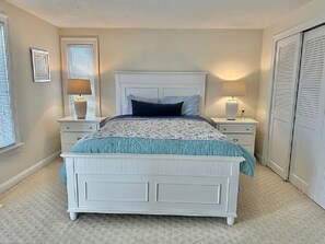 Master bedroom, queen bed, tons of closet space. Office desk. Full dresser.