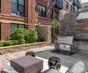 Courtyards with grilling kitchen and outdoor fire features