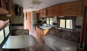 View of living room/kitchen area.