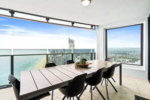 Enjoy your morning coffee in this spacious balcony overlooking the ocean/city