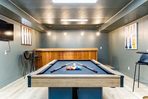Enjoy a game of pool with your friends in the Rec Room!