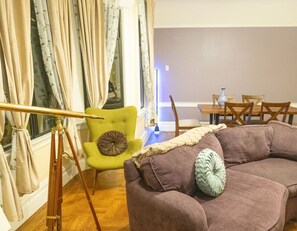 Enjoy sweeping views of the Golden Gate Bridge and city skyline by the classic bay windows.