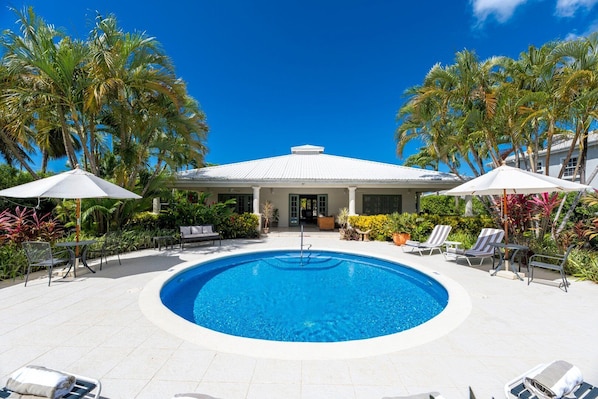 View of the large pool deck and property
