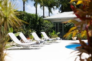 Relax by the pool on one of our sun loungers