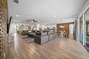 Relaxing and vibrant living space seamlessly connected to the kitchen and dining space