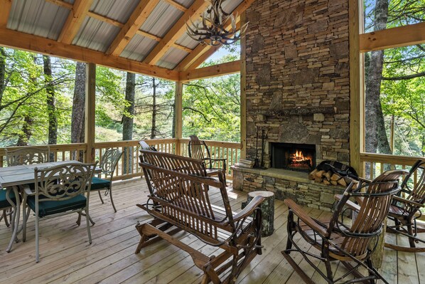 Covered Porch With Wood Burning Fireplace
