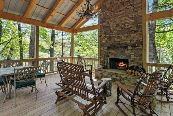 Covered Porch With Wood Burning Fireplace