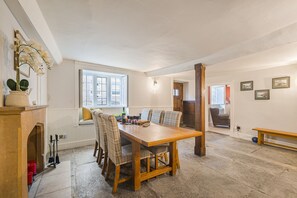 Beech House, Evershot: The dining room with original flagstone flooring
