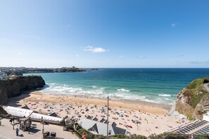 Your sun-drenched terrace provides glistening views across Tolcarne Beach