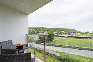 Sandcastles 11 Europa Court, Mawgan Porth: Enjoy distance views of Mawgan Porth from your private balcony
