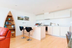 11 Zinc, Newquay: The open-plan living area is bright and spacious, complete with a superbly equipped kitchen